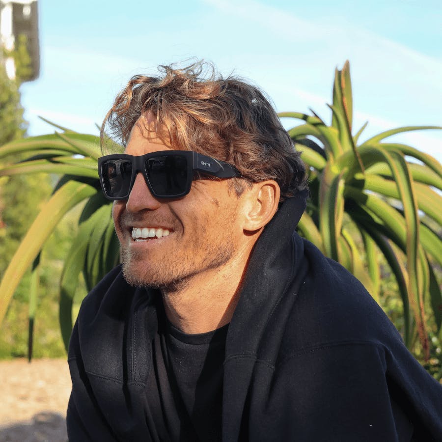 Man wearing eco-friendly sunglasses