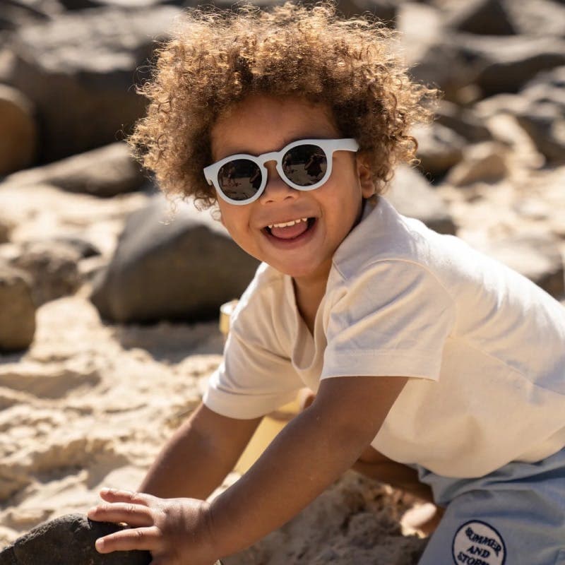 Kid wearing sunglasses