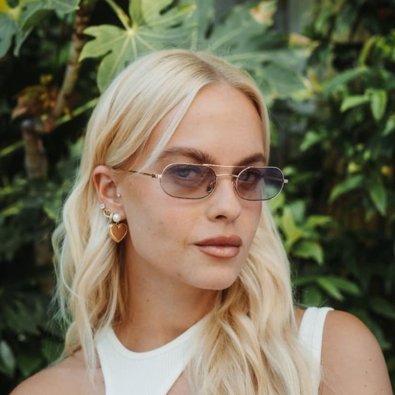 Woman wearing petite sunglasses