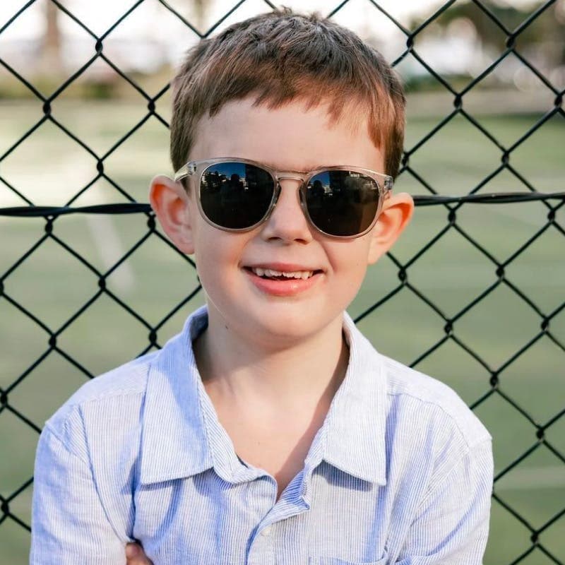 Kid wearing sunglasses